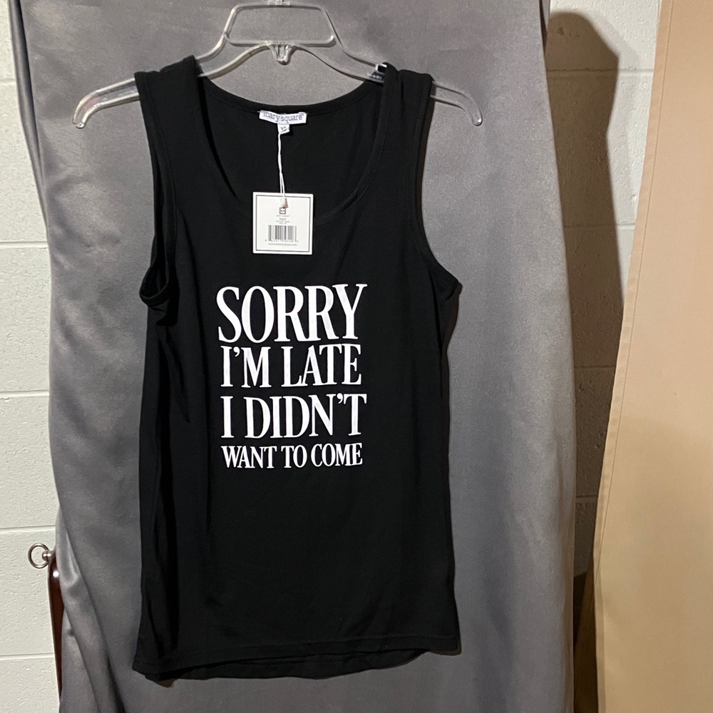 Black Graphic Tank Top with Bold Statement. Generous fit.